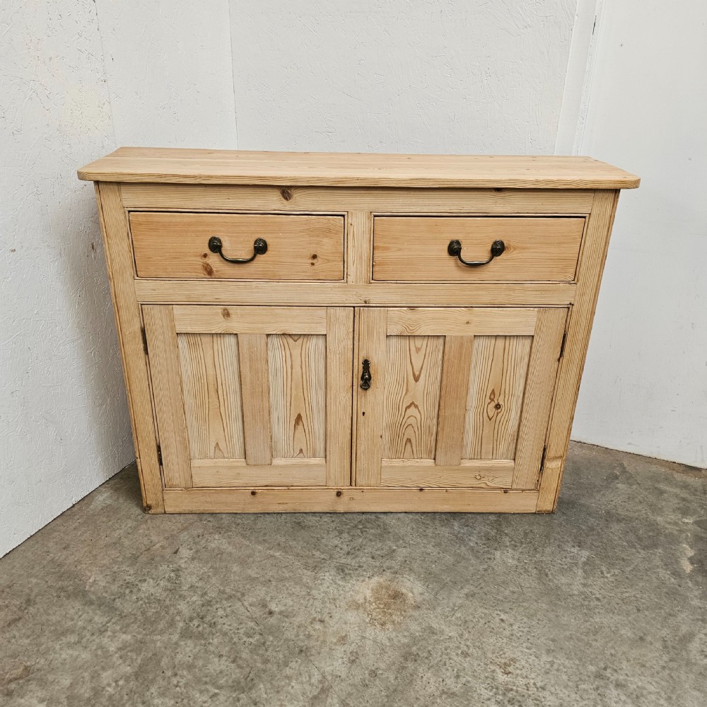 Slim English Pine Cabinet.
