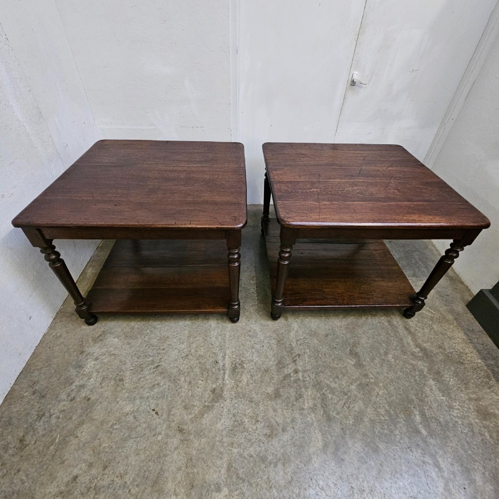 A matching pair of dark French oak square low display tables featuring turned legs and a solid lower tier shelf. View V