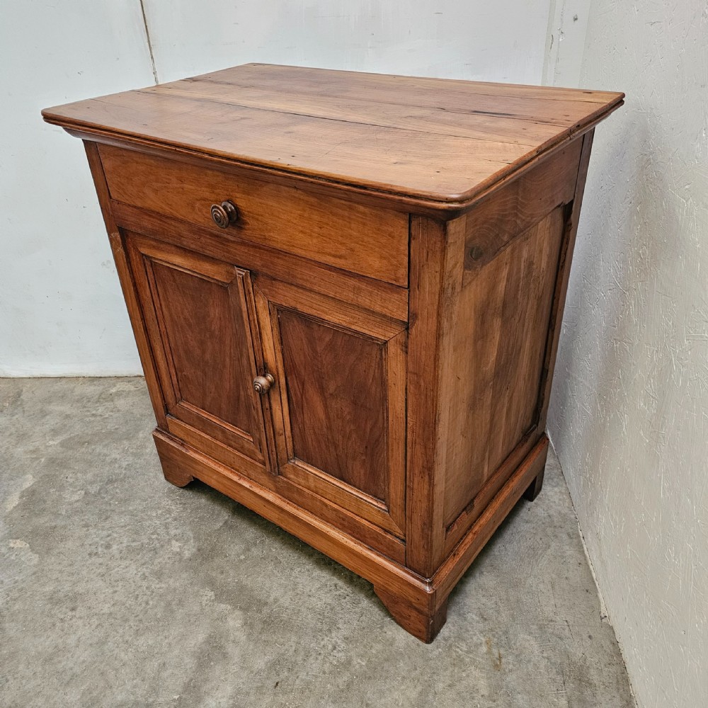 A 19th-century French provincial cherry wood buffet with a single full-width drawer above a two-door cabinet with turned wooden knobs. View V
