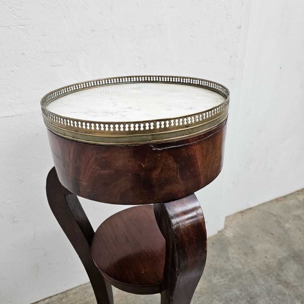 A tall French mahogany tripod stand featuring an inset circular white marble top with a pierced brass gallery and a lower circular shelf. View III