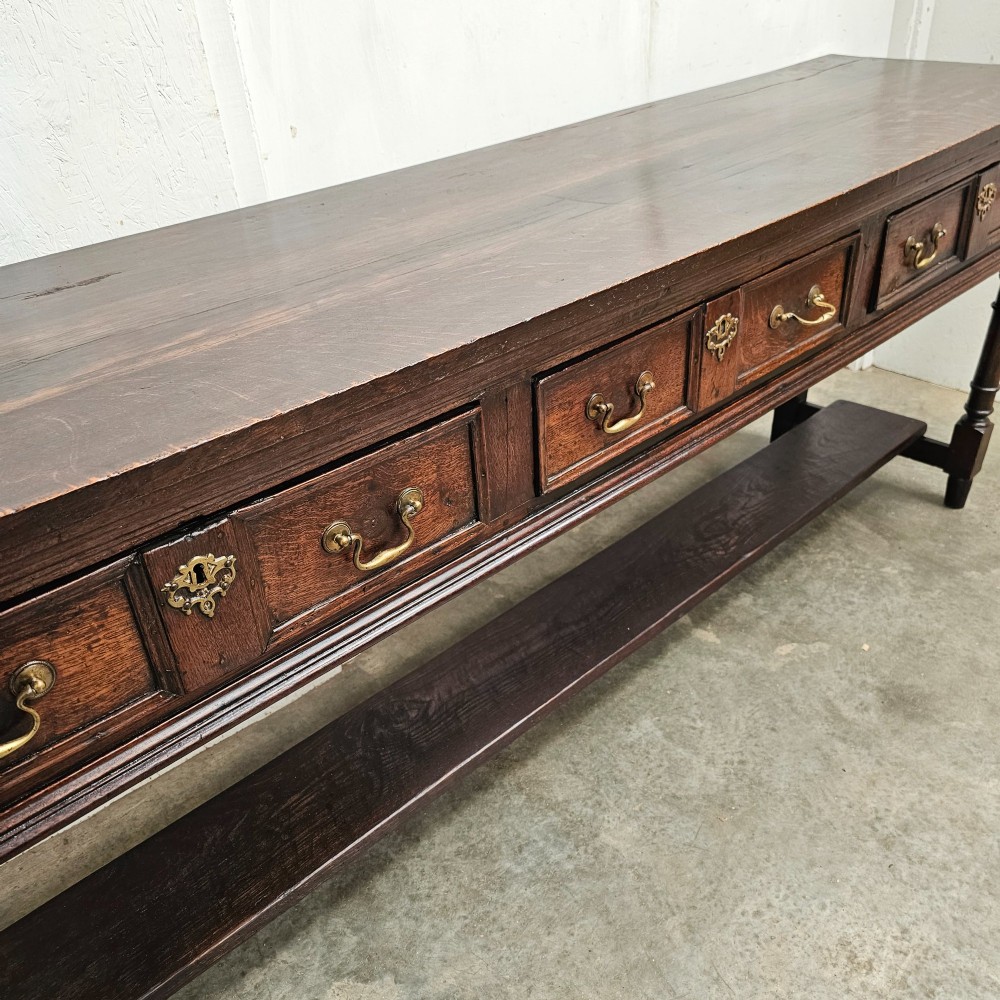 English Oak Three Drawer Sideboard With Potshelf View II