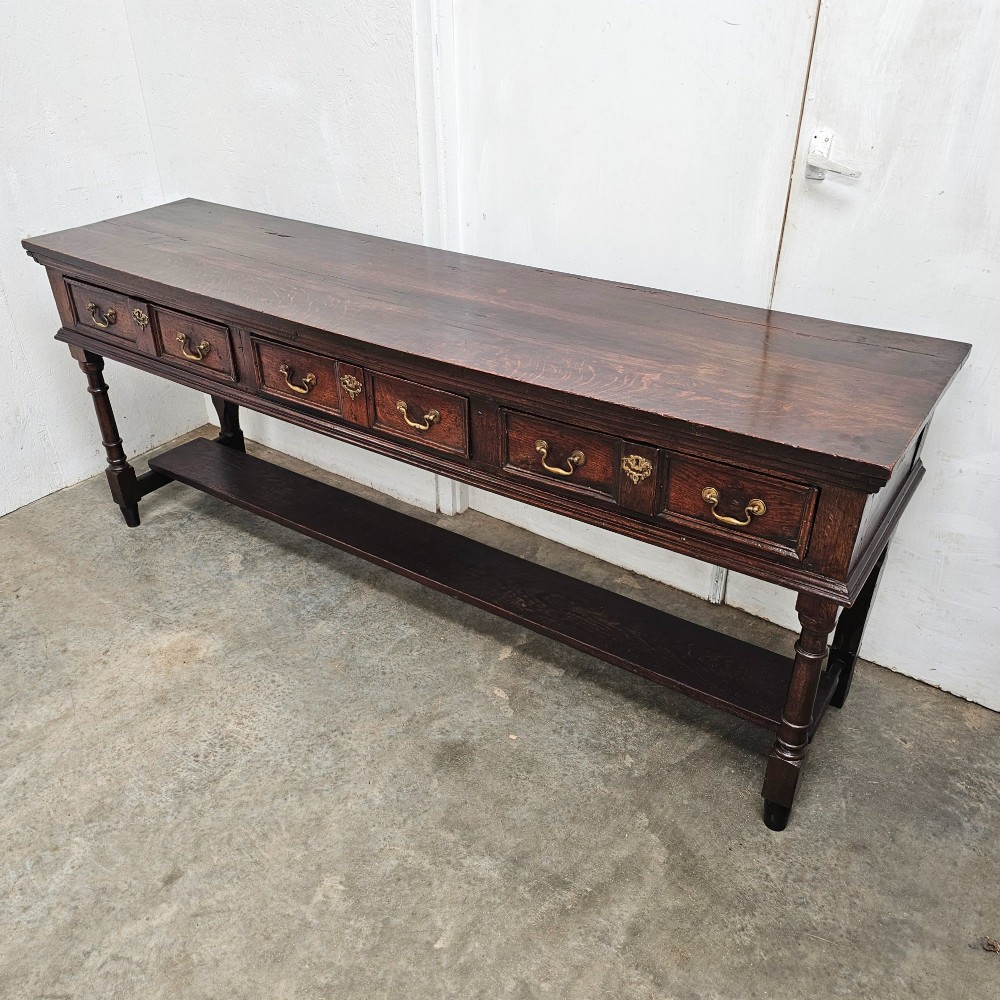 English Oak Three Drawer Sideboard With Potshelf