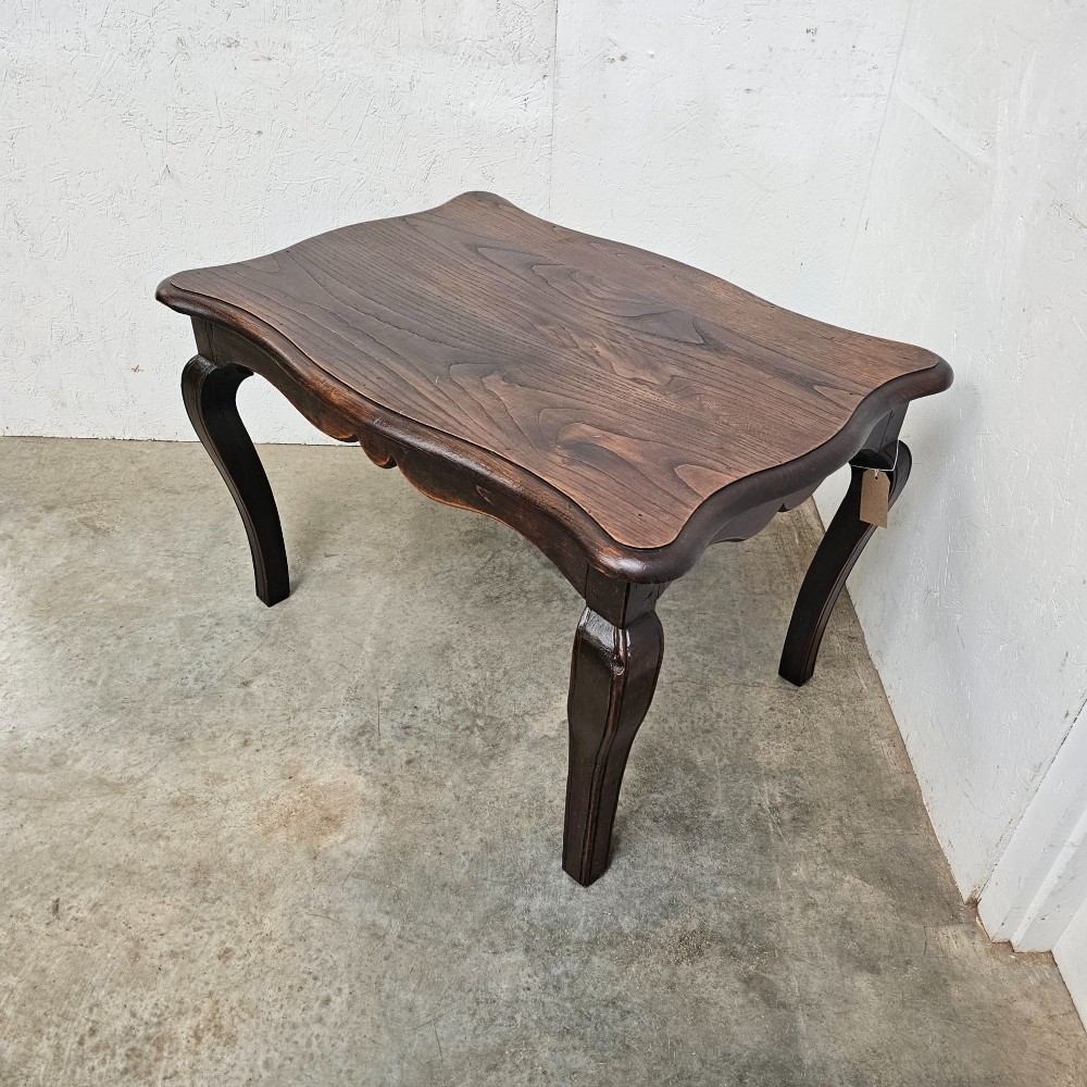 A dark brown French provincial chestnut low table featuring cabriole legs and a contoured apron. View III