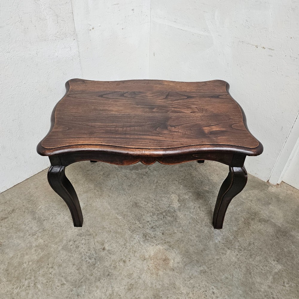 A dark brown French provincial chestnut low table featuring cabriole legs and a contoured apron. View IV