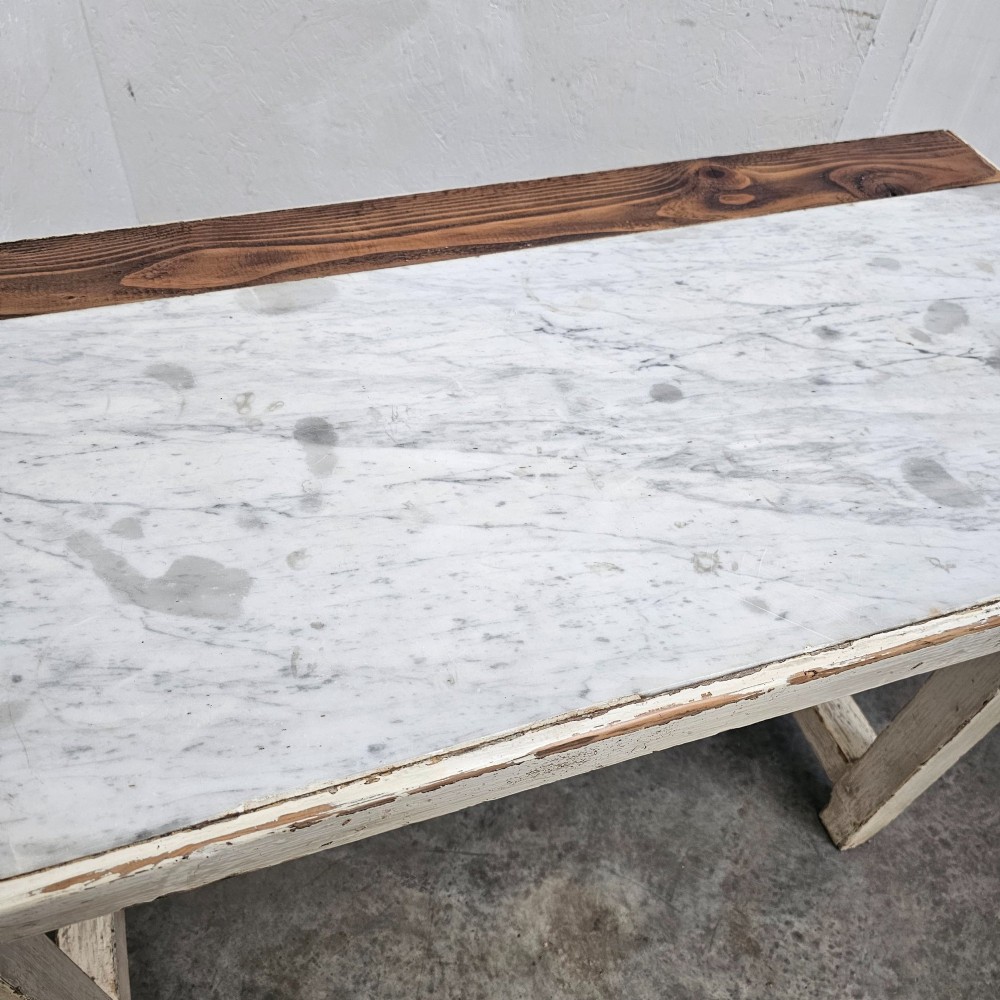A French rustic off-white painted timber prep table featuring an inset white marble top surface and lower stretchers. View II