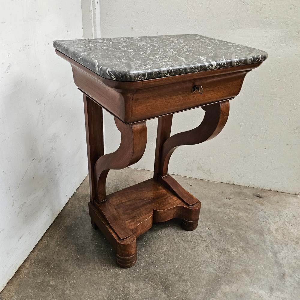 A French walnut console table featuring a grey veined marble top, a single frieze drawer, shaped upright supports, and a shaped plinth base. View II