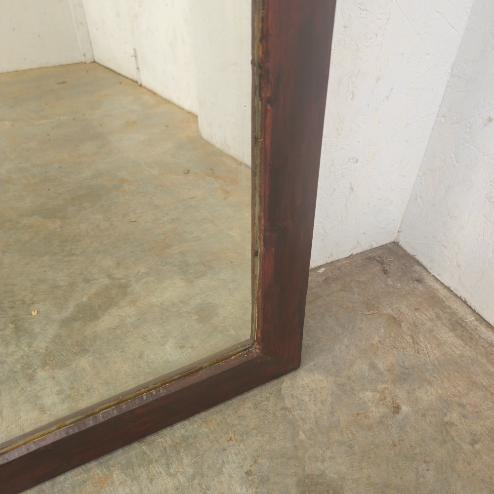 A large 19th-century rectangular full-length mirror with a dark-stained pine frame. View II