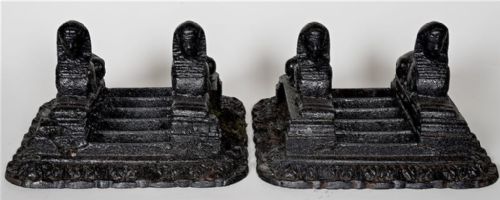 A pair of Egyptian revival early 19th century cast iron boot scrapers.