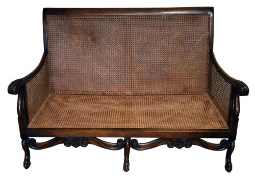 For sale an Edwardian Bergere sofa. 