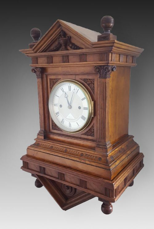 Offered for sale is this oak bracket twin fusee clock by Dent, London. 