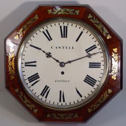 AN OCTAGONAL ENGLISH LATE VICTORIAN ROSEWOOD AND BRASS INLAY 12INCH DIAL CLOCK