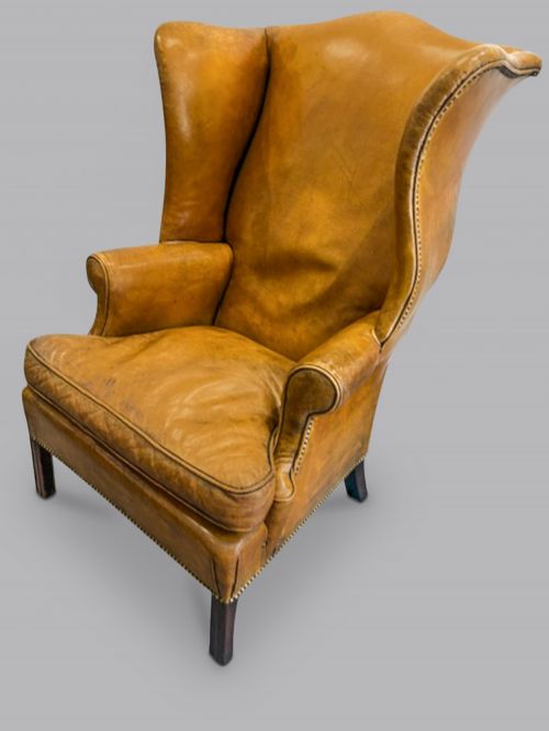 GEORGE III WING CHAIR IN LEATHER CIRCA 1800