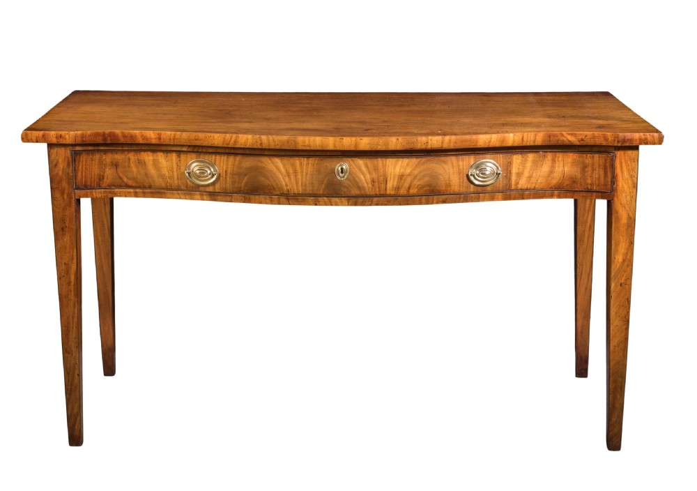George III well figured mahogany serpentine side table. Circa 1760