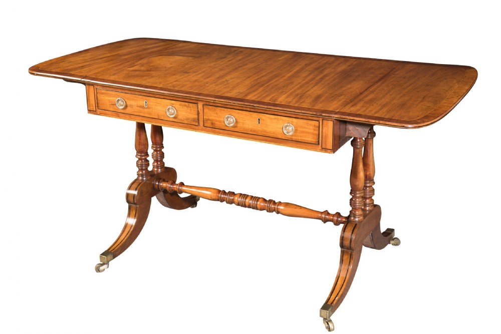 George III mahogany sofa table. Circa 1810
