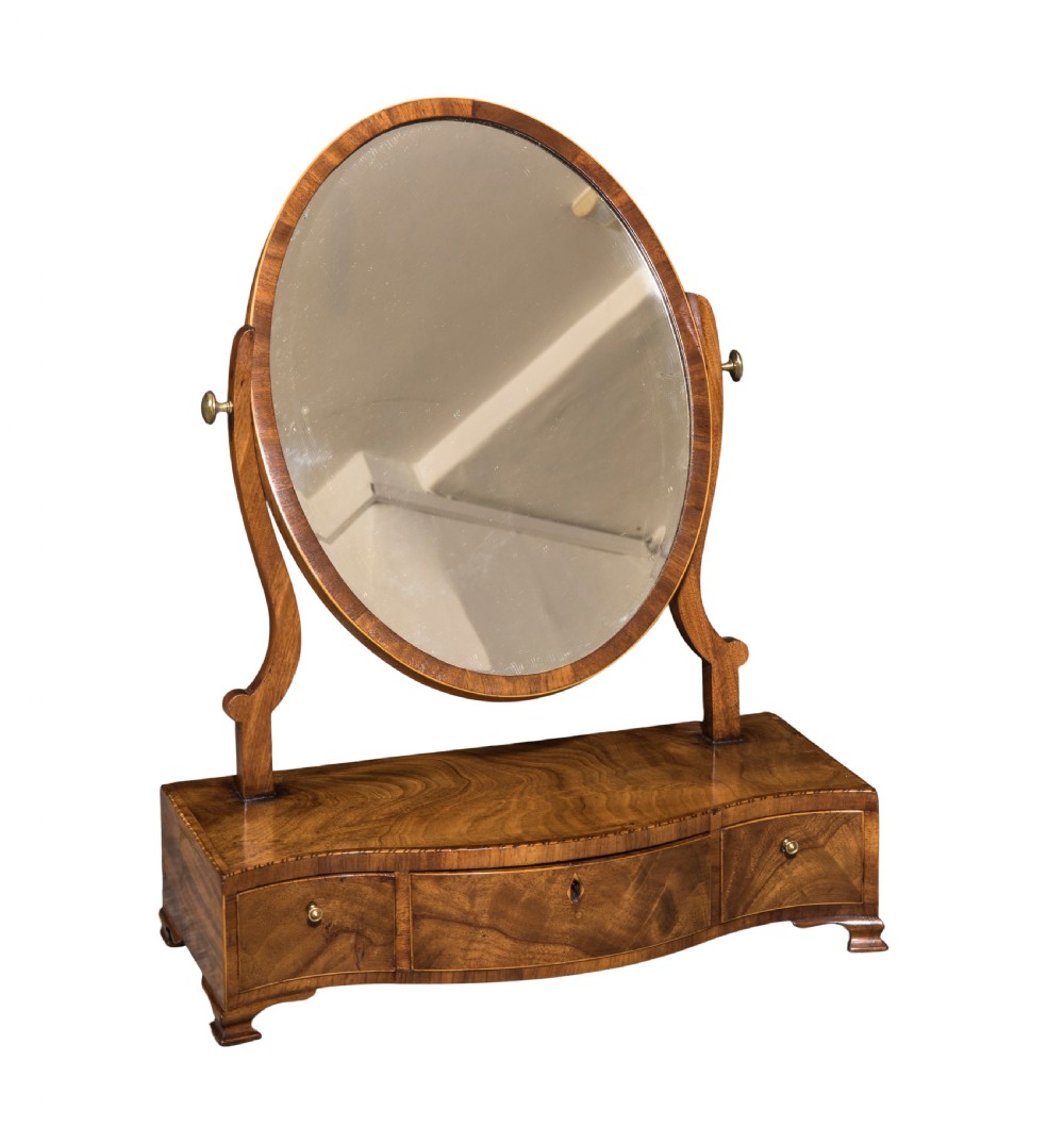 George III mahogany serpentine dressing table mirror. Circa 1790