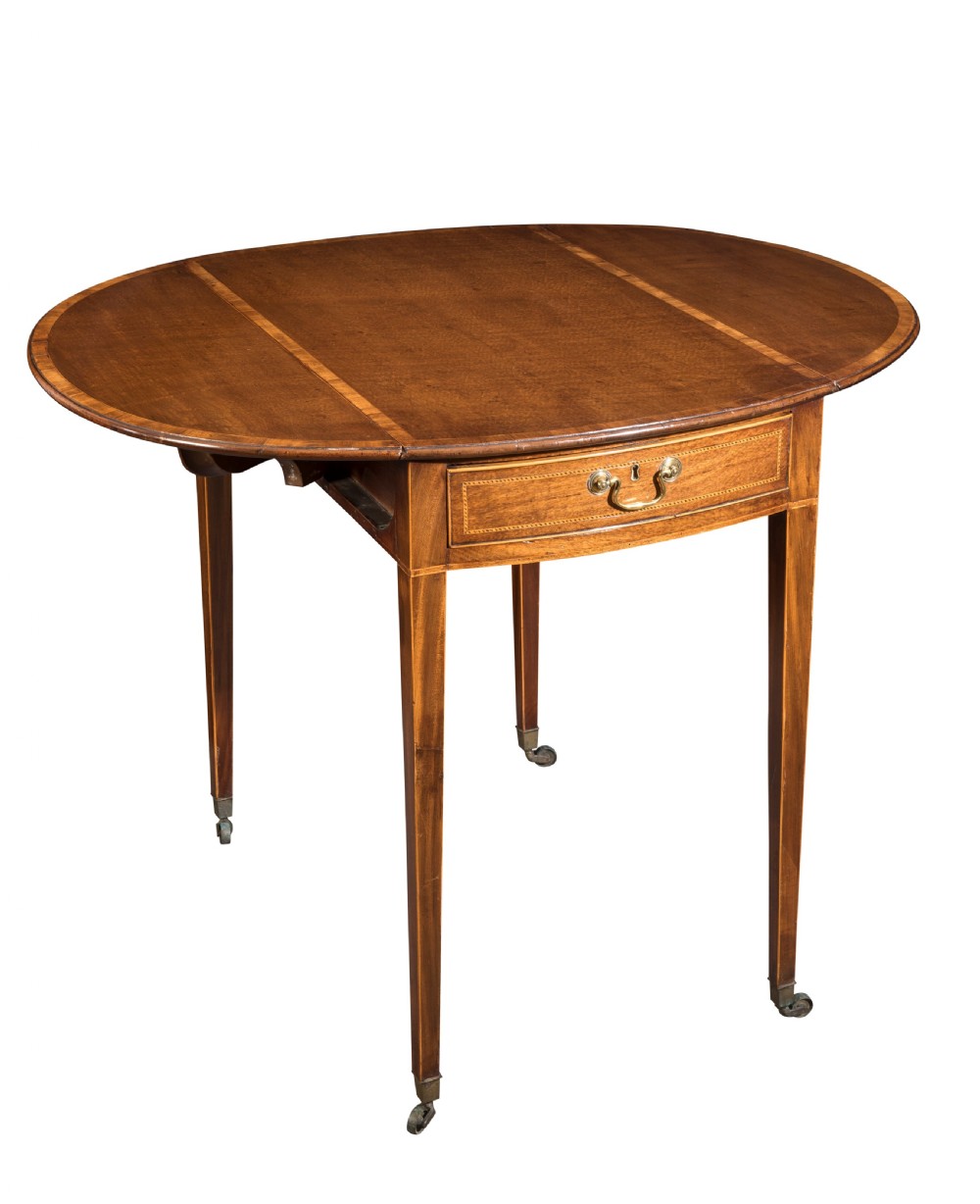 George III mahogany oval fiddleback Pembroke table. Circa 1790