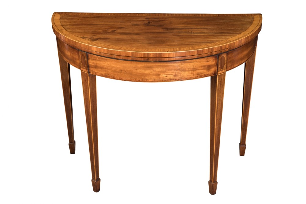George III mahogany demi-lune card table. Circa 1790.