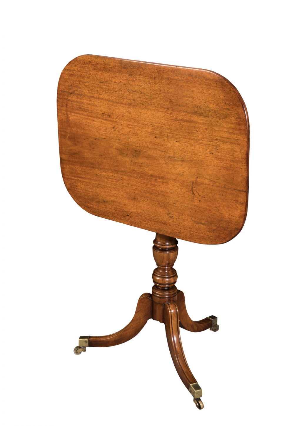 George III mahogany tripod table on turned pedestal. Circa 1815 View II