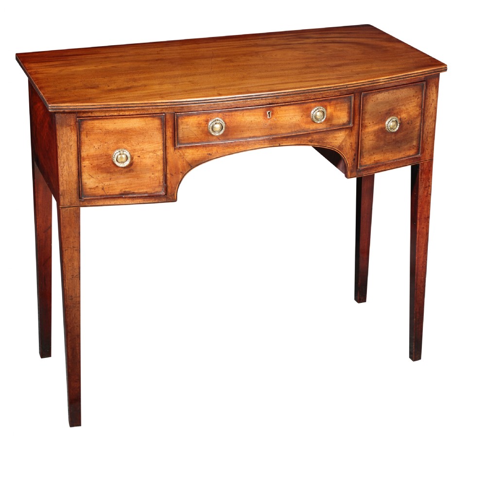 George III mahogany bowfront dressing table. Circa 1800