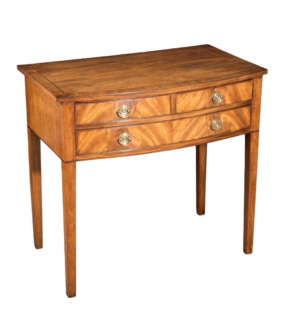 George III mahogany bow front side table. Circa 1790