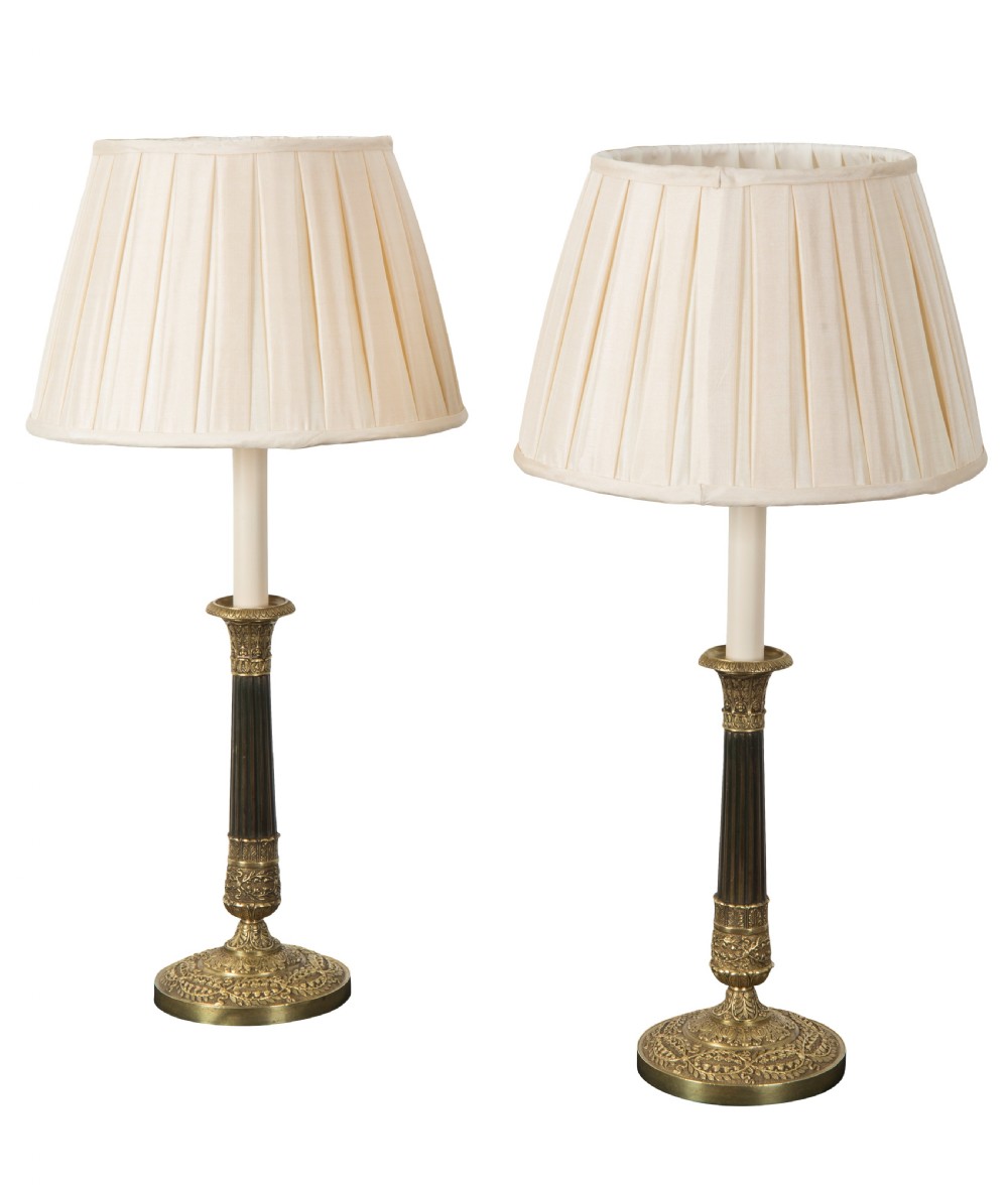Pair of Regency bronze & gilt candlestick lamps. Circa 1820