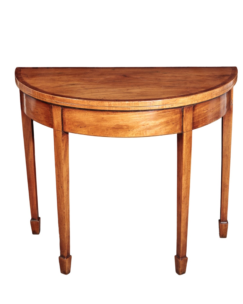 George III mahogany demi-lune card table. Circa 1790