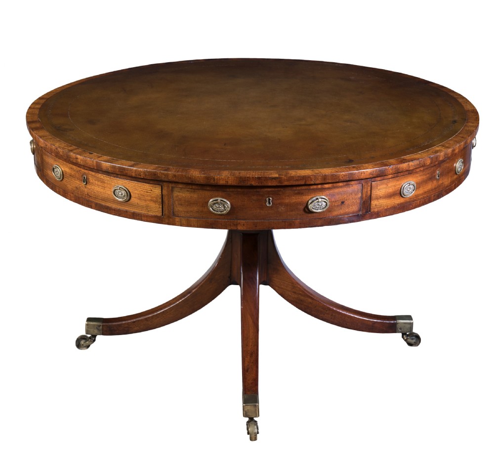 Regency mahogany leather top drum table. Circa 1810