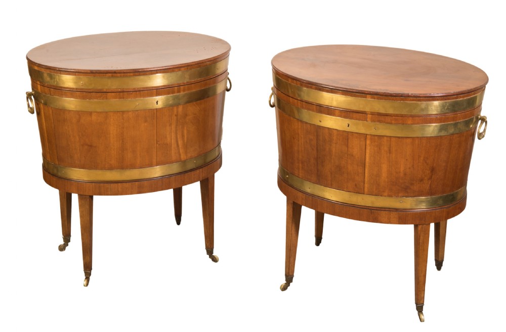 Pair of George III mahogany brass bound wine coolers. Circa 1780