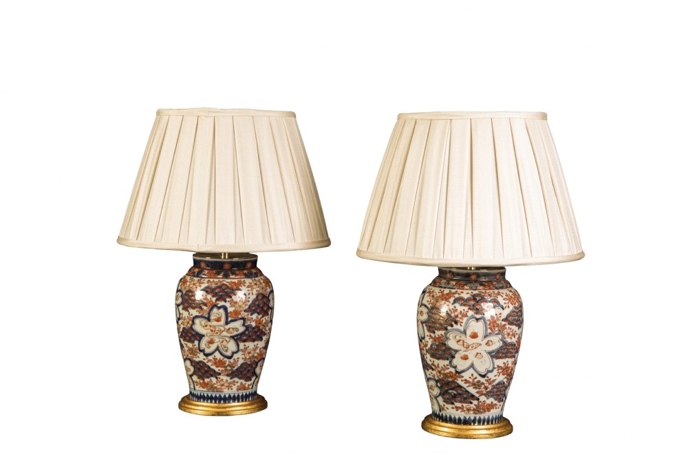 Pair of small late 19th century Imari lamps with shades. Circa 1890