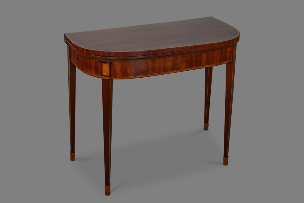 A good pair of George III mahogany D-shaped card tables View II