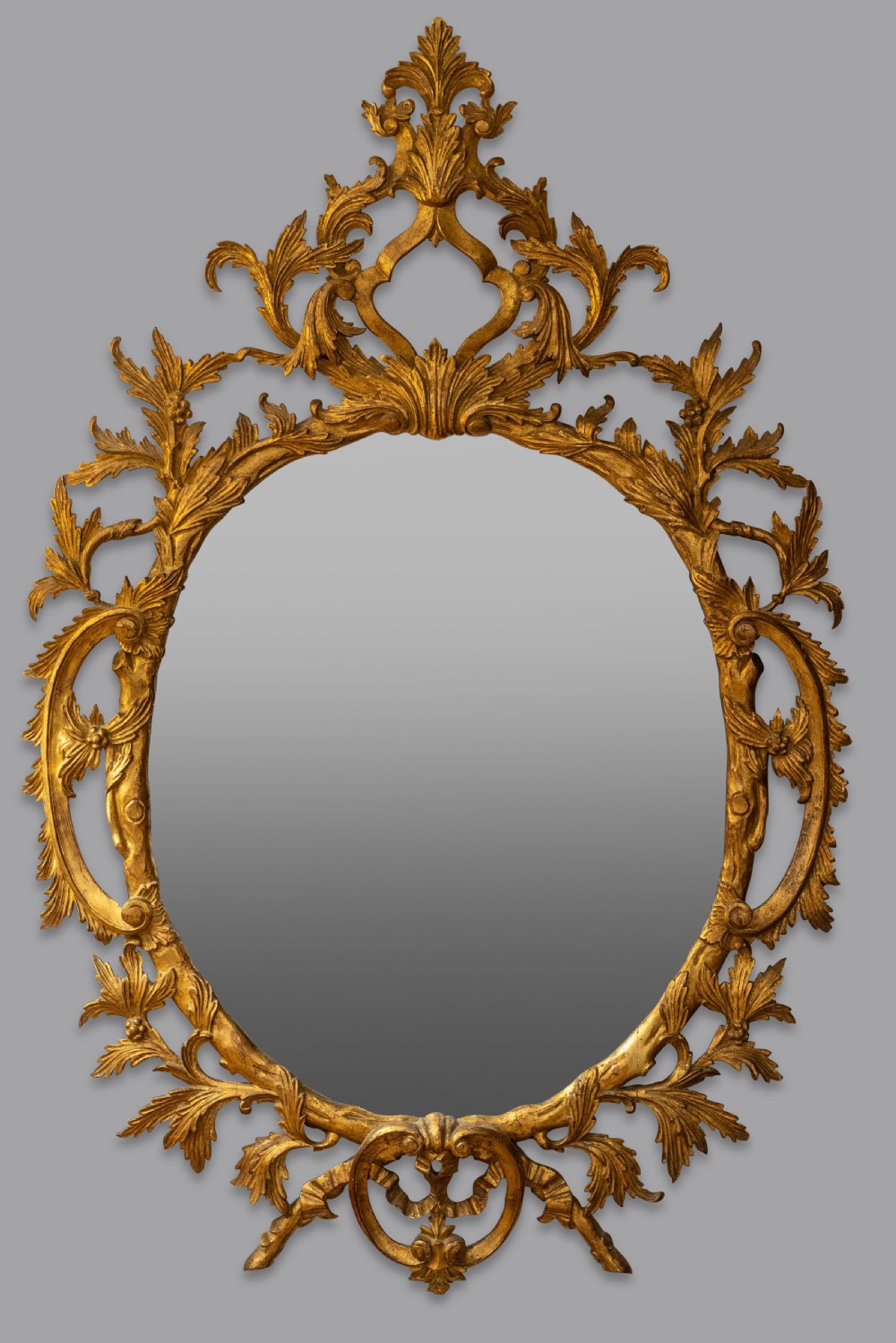 A fine Large carved 19th Century chippendale style gilt mirror 