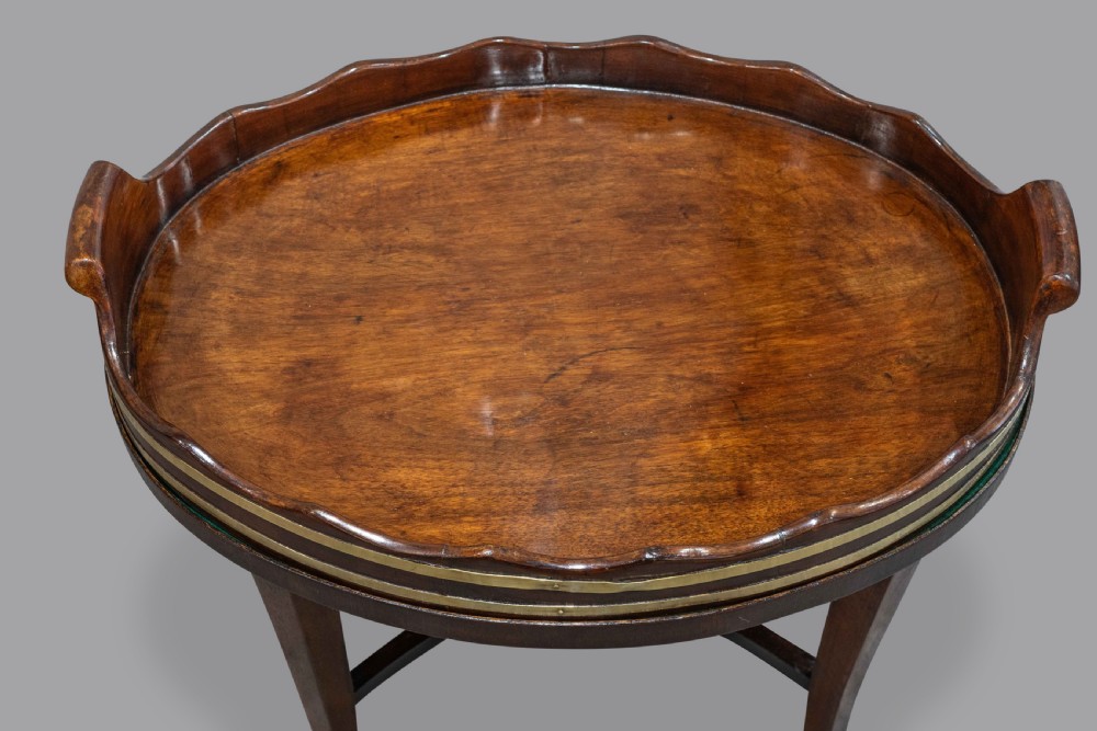 A George III mahogany small brass tray on later stand 
 View II