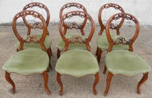 Set of Six Victorian Carved Walnut Dining Chairs
