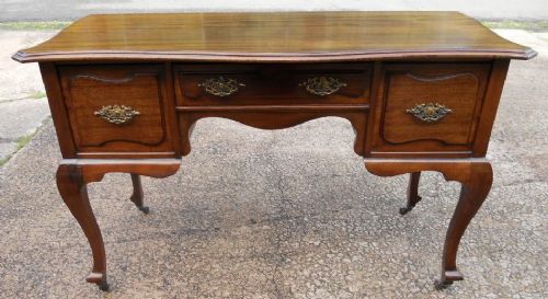 Edwardian Mahogany Shaped Front Kneehole Writing Desk