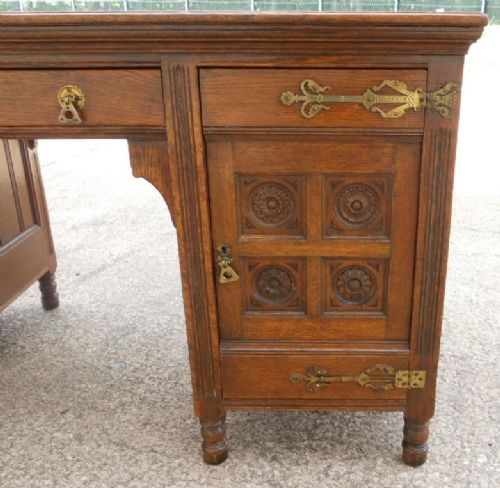 fig 1. Aesthetic Movement Oak Panelled Kneehole Writing Desk