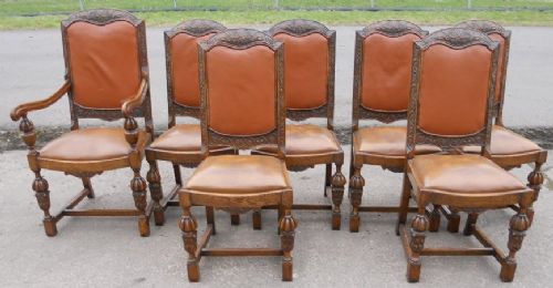 Set of Seven Carved Oak Dining Chairs