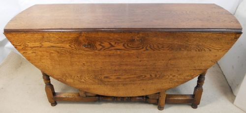 Large Oak Circular Top Gateleg Dining Table to Seat Ten