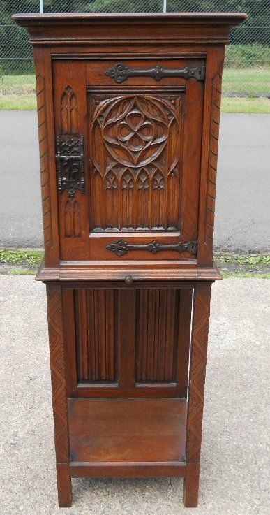 Narrow Carved Cupboard on Stand