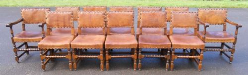 Set of Twelve Cromwellian Style Leather & Oak Dining Chairs