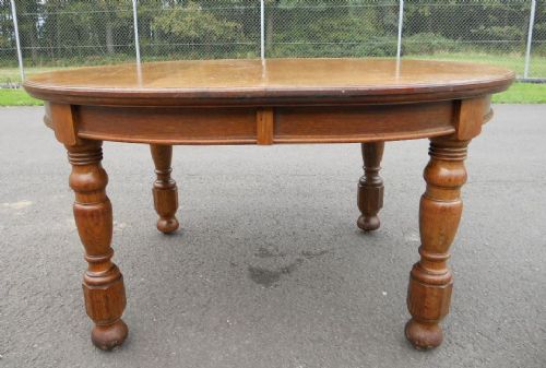fig 1. Oval Oak Extending Dining Table to Seat Ten
