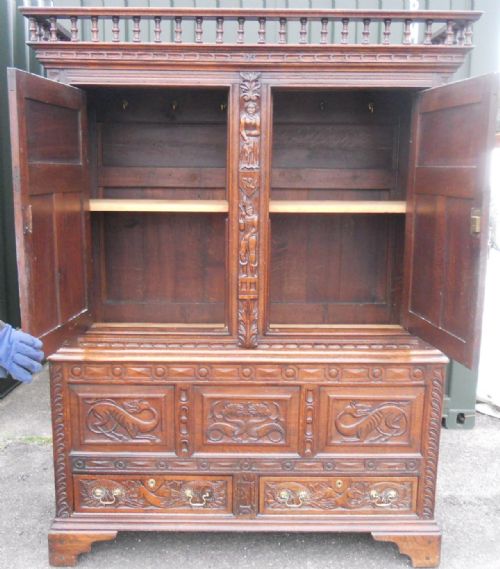 HEAVILY CARVED OAK WARDROBE CUPBOARD - ADDITIONAL PHOTO 11