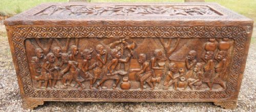 Heavily Carved 'Primitive African Scenes' Blanket Chest