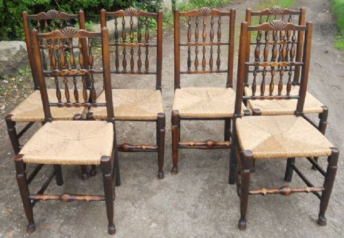 Set of Six Antique Elm Spindleback Rush Seat Dining Chairs
