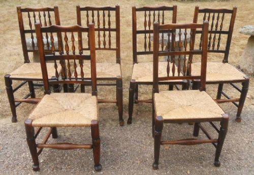 Six Lancashire Elm Spindle Back Dining Chairs
