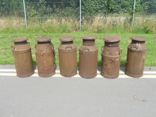 Six Vintage Metal Milk Churns