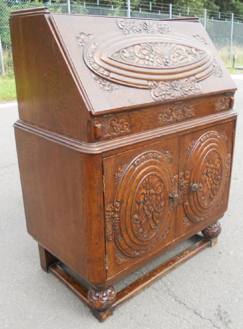 CARVED OAK WRITING BUREAU WITH MOVING INTERIOR - ADDITIONAL PHOTO 1