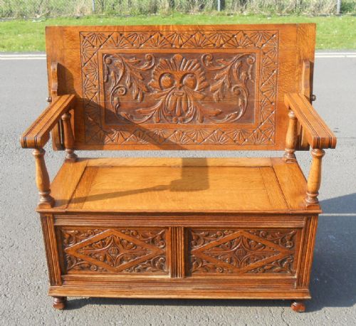 Golden Oak Carved Monks Bench