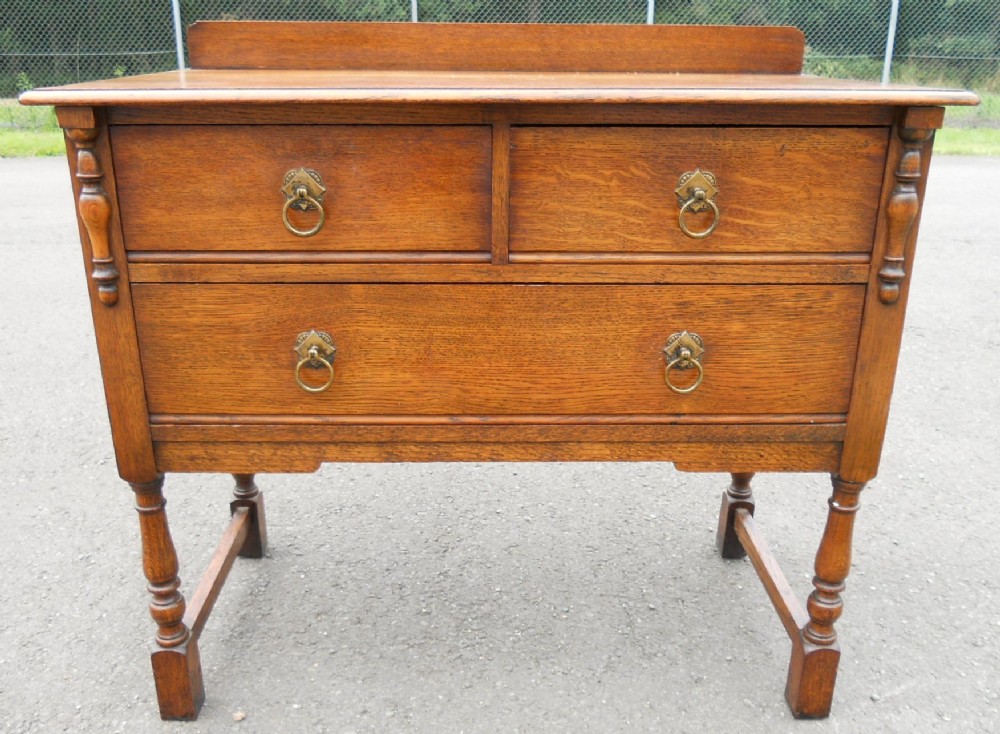 Oak Chest of Drawers by Waring & Gillow