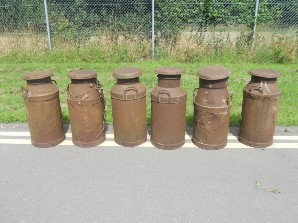 Six Vintage Metal Milk Churns