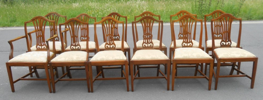 Set of Twelve Hepplewhite Style Mahogany Dining Chairs 